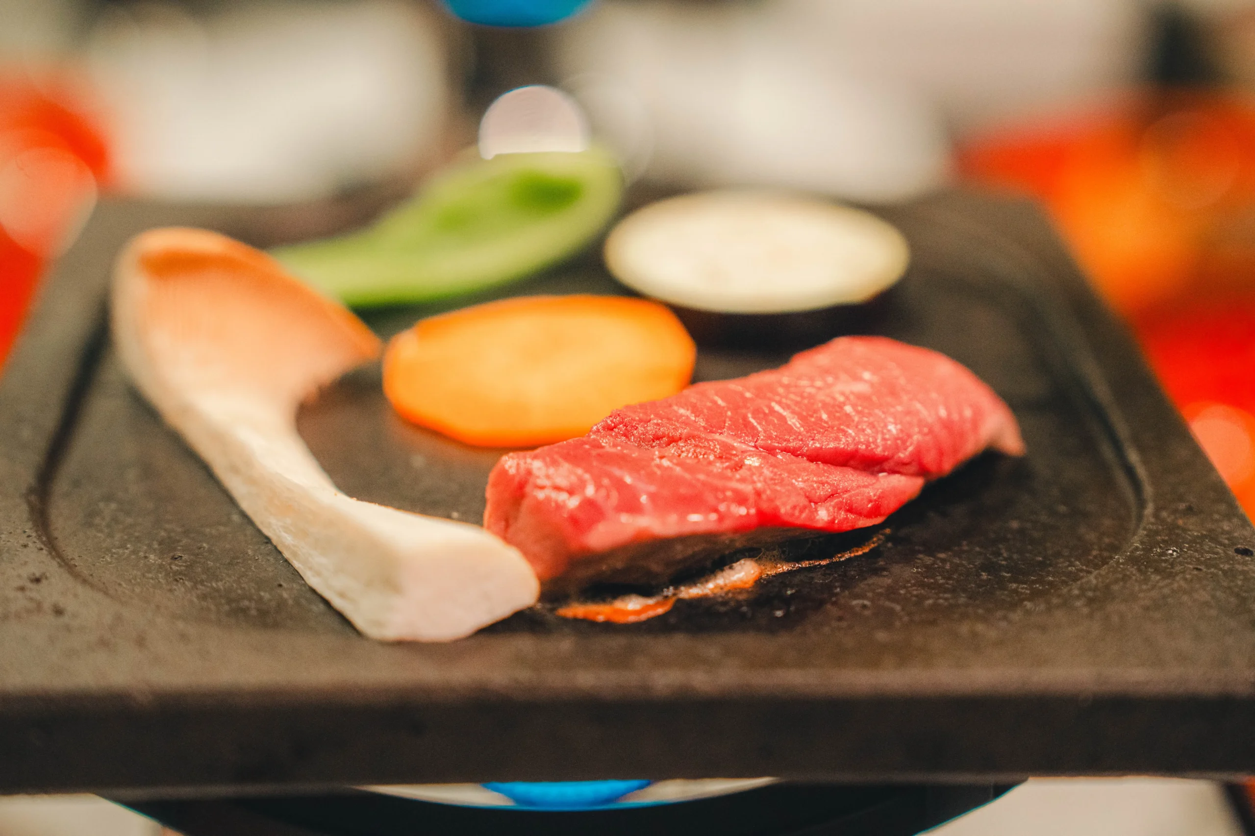Grilled Fukushima beef on a ceramic plate
