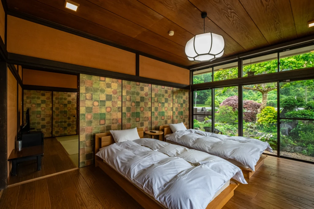 A Japanese-Western room offering both tatami relaxation and bed comfort