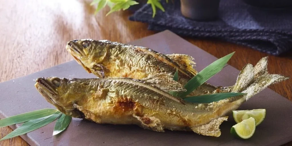 Wild sweetfish from the Warashina River, grilled whole to fragrant perfection